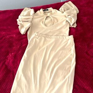 Size L top and skirt. The top features flair short sleeves.